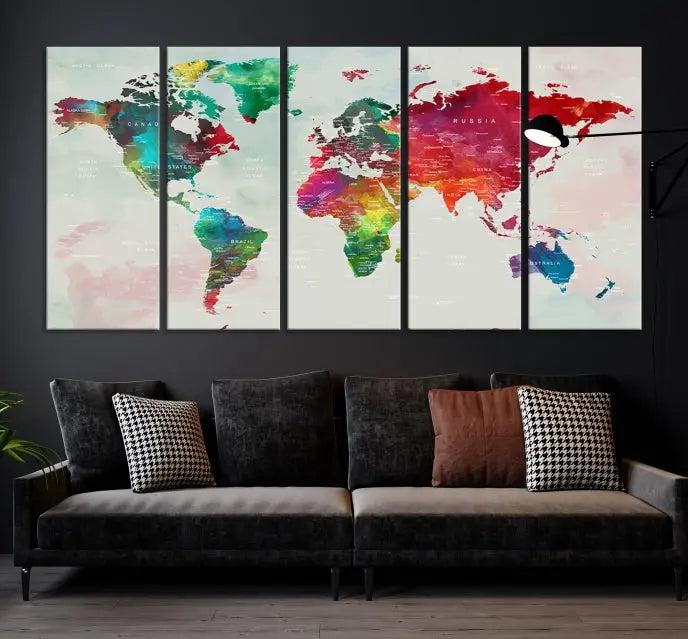 The World Map Wall Art Canvas Print features colorful watercolor continents across three panels, crafted on museum-quality canvas and ready to hang.