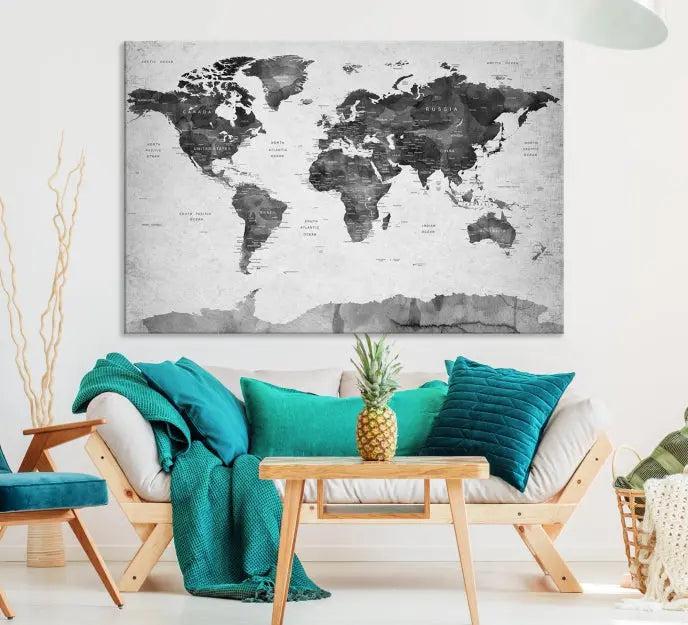 The World Map Wall Art Canvas Print features a three-panel design, printed on museum-quality canvas with a UV-protective coating, and is elegantly displayed on a dark wall.