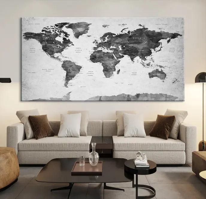 The World Map Wall Art Canvas Print features a three-panel design, printed on museum-quality canvas with a UV-protective coating, and is elegantly displayed on a dark wall.