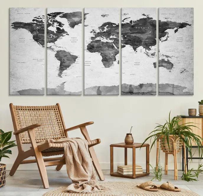 The World Map Wall Art Canvas Print features a three-panel design, printed on museum-quality canvas with a UV-protective coating, and is elegantly displayed on a dark wall.