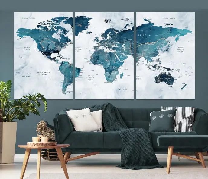 A World Map Wall Art Canvas Print, consisting of three panels and crafted on museum-quality canvas with a UV-protective coating, is showcased in the stylish living room.