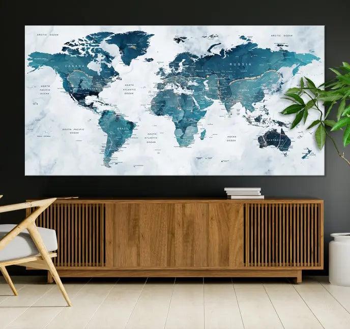 A World Map Wall Art Canvas Print, consisting of three panels and crafted on museum-quality canvas with a UV-protective coating, is showcased in the stylish living room.