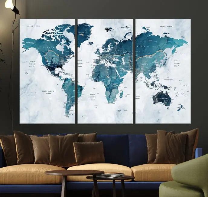 A World Map Wall Art Canvas Print, consisting of three panels and crafted on museum-quality canvas with a UV-protective coating, is showcased in the stylish living room.