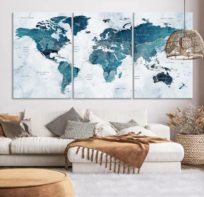 A World Map Wall Art Canvas Print, consisting of three panels and crafted on museum-quality canvas with a UV-protective coating, is showcased in the stylish living room.