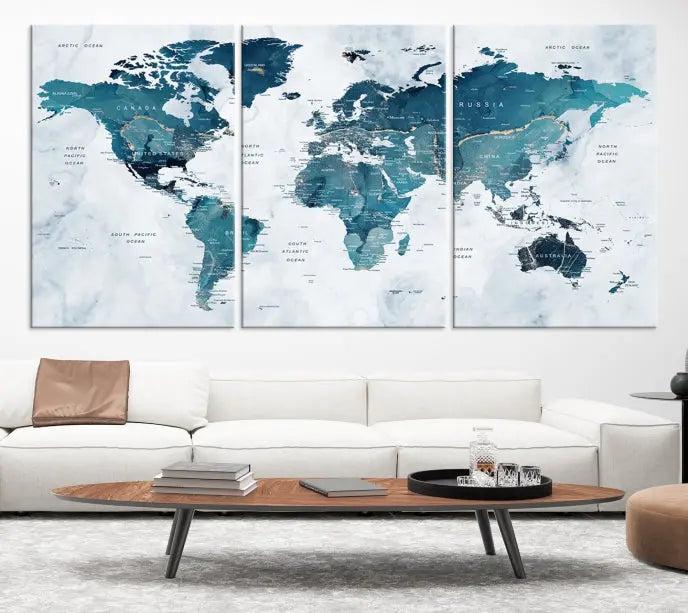 A World Map Wall Art Canvas Print, consisting of three panels and crafted on museum-quality canvas with a UV-protective coating, is showcased in the stylish living room.