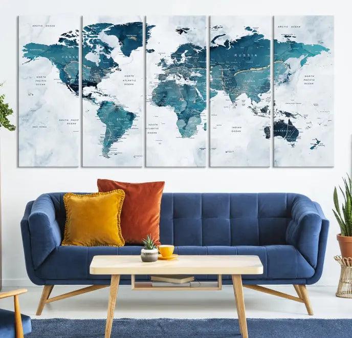 A World Map Wall Art Canvas Print, consisting of three panels and crafted on museum-quality canvas with a UV-protective coating, is showcased in the stylish living room.