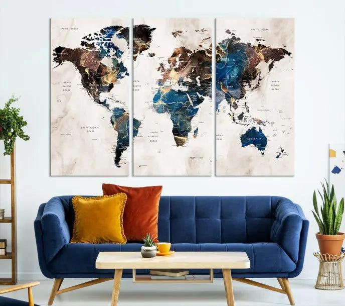 A striking three-panel World Map Wall Art Canvas Print, crafted by a skilled artisan, adorns the wall in this modern living room. This piece, printed on museum-quality canvas with a UV-protective coating, combines elegance and longevity.