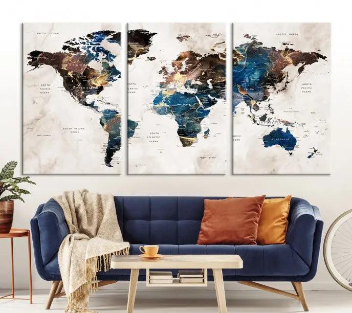 A striking three-panel World Map Wall Art Canvas Print, crafted by a skilled artisan, adorns the wall in this modern living room. This piece, printed on museum-quality canvas with a UV-protective coating, combines elegance and longevity.