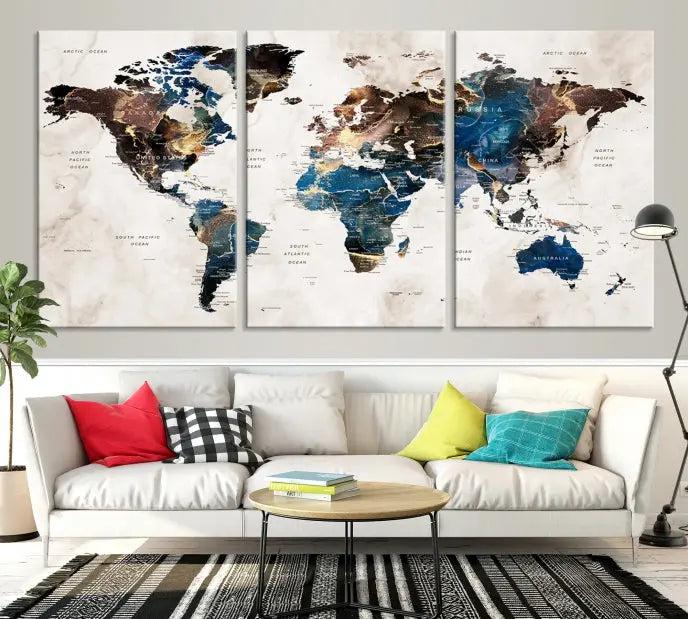 A striking three-panel World Map Wall Art Canvas Print, crafted by a skilled artisan, adorns the wall in this modern living room. This piece, printed on museum-quality canvas with a UV-protective coating, combines elegance and longevity.