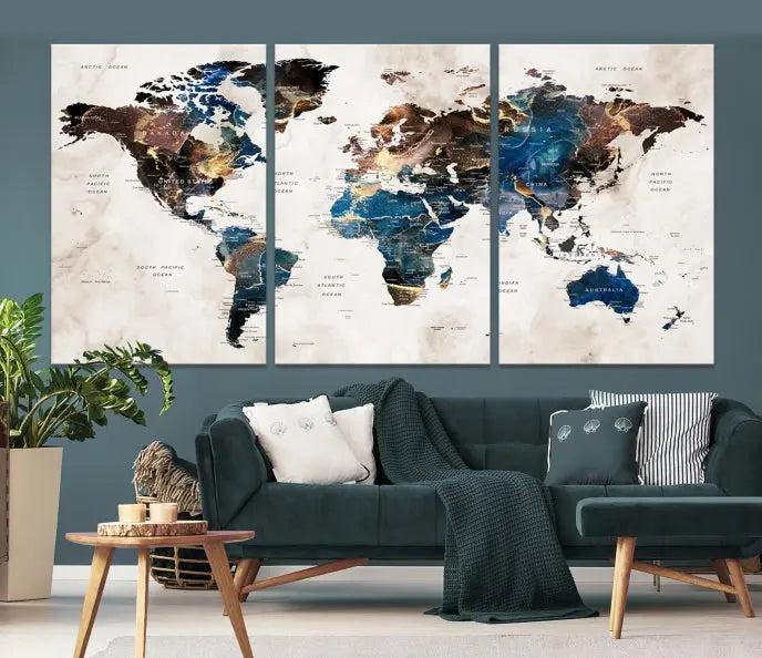 A striking three-panel World Map Wall Art Canvas Print, crafted by a skilled artisan, adorns the wall in this modern living room. This piece, printed on museum-quality canvas with a UV-protective coating, combines elegance and longevity.