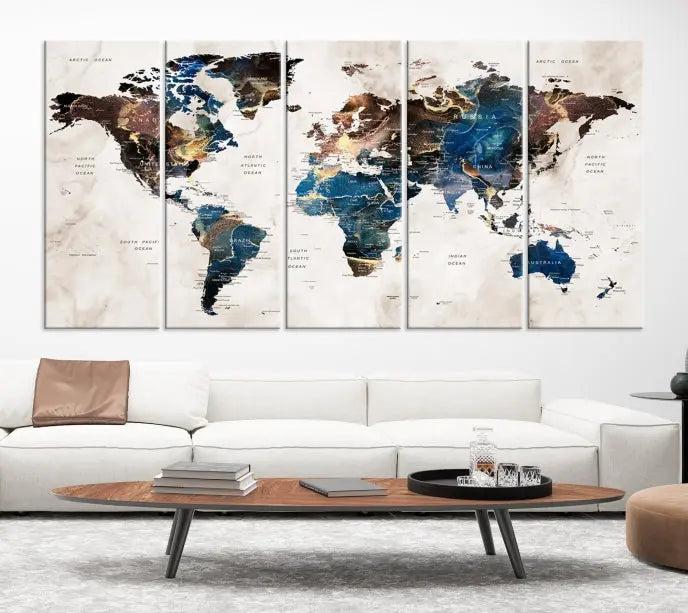 A striking three-panel World Map Wall Art Canvas Print, crafted by a skilled artisan, adorns the wall in this modern living room. This piece, printed on museum-quality canvas with a UV-protective coating, combines elegance and longevity.