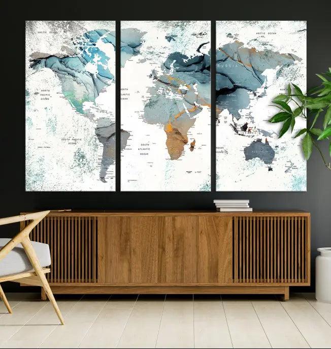 A *World Map Wall Art Canvas Print* featuring three panels is displayed on a dark wall. Crafted with museum-quality canvases and UV-protective coating for durability, this timeless piece is ready to enhance any room.