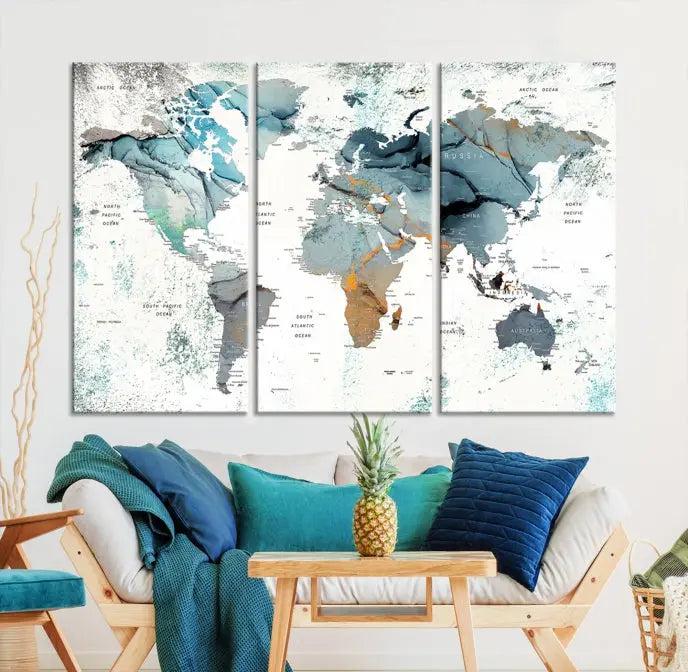 A *World Map Wall Art Canvas Print* featuring three panels is displayed on a dark wall. Crafted with museum-quality canvases and UV-protective coating for durability, this timeless piece is ready to enhance any room.