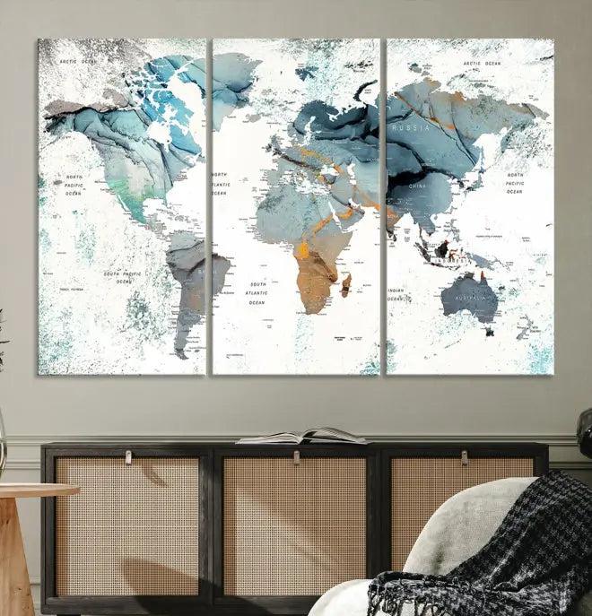 A *World Map Wall Art Canvas Print* featuring three panels is displayed on a dark wall. Crafted with museum-quality canvases and UV-protective coating for durability, this timeless piece is ready to enhance any room.