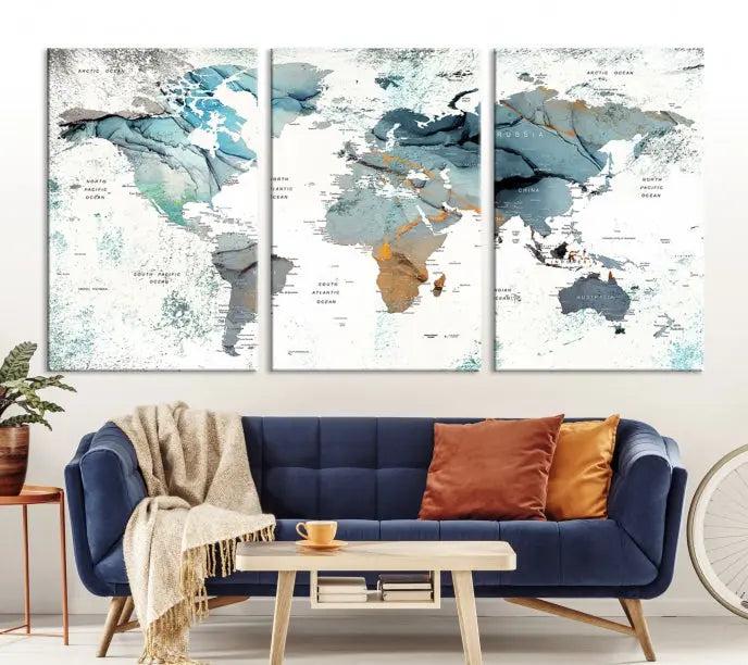 A *World Map Wall Art Canvas Print* featuring three panels is displayed on a dark wall. Crafted with museum-quality canvases and UV-protective coating for durability, this timeless piece is ready to enhance any room.