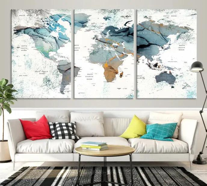 A *World Map Wall Art Canvas Print* featuring three panels is displayed on a dark wall. Crafted with museum-quality canvases and UV-protective coating for durability, this timeless piece is ready to enhance any room.