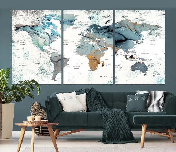 A *World Map Wall Art Canvas Print* featuring three panels is displayed on a dark wall. Crafted with museum-quality canvases and UV-protective coating for durability, this timeless piece is ready to enhance any room.