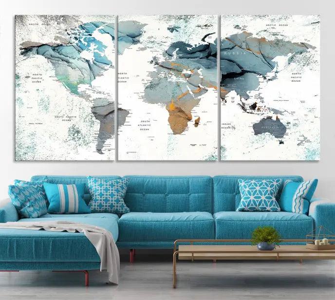 A *World Map Wall Art Canvas Print* featuring three panels is displayed on a dark wall. Crafted with museum-quality canvases and UV-protective coating for durability, this timeless piece is ready to enhance any room.