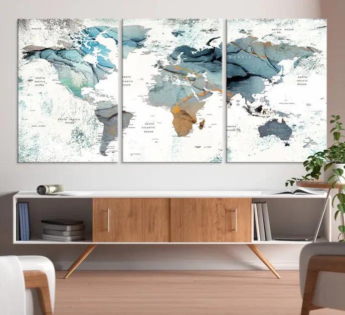 A *World Map Wall Art Canvas Print* featuring three panels is displayed on a dark wall. Crafted with museum-quality canvases and UV-protective coating for durability, this timeless piece is ready to enhance any room.