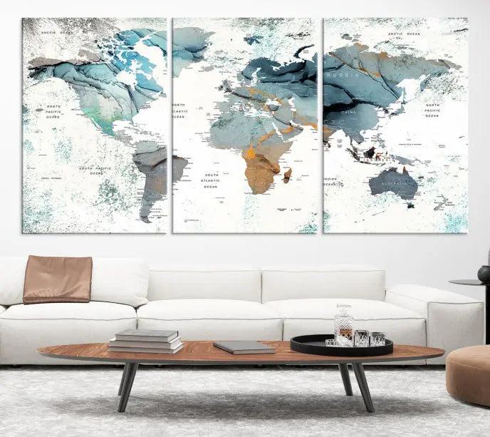 A *World Map Wall Art Canvas Print* featuring three panels is displayed on a dark wall. Crafted with museum-quality canvases and UV-protective coating for durability, this timeless piece is ready to enhance any room.