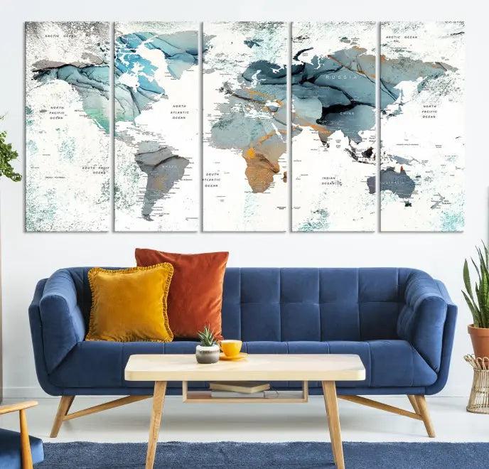 A *World Map Wall Art Canvas Print* featuring three panels is displayed on a dark wall. Crafted with museum-quality canvases and UV-protective coating for durability, this timeless piece is ready to enhance any room.