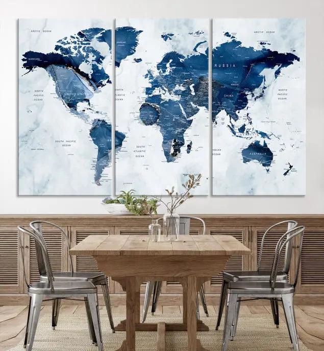 World Map Wall Art Canvas Print featuring blue continents on a textured backdrop, crafted with museum-quality polycotton and gallery-wrapped.