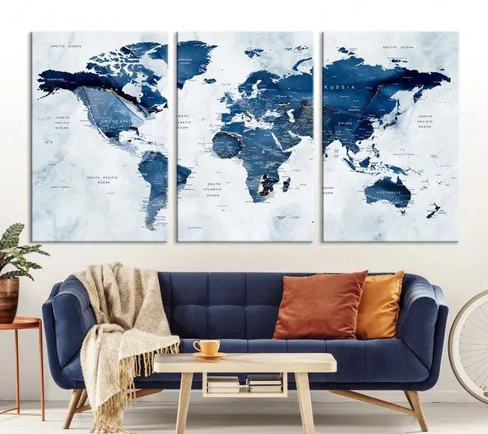 World Map Wall Art Canvas Print featuring blue continents on a textured backdrop, crafted with museum-quality polycotton and gallery-wrapped.