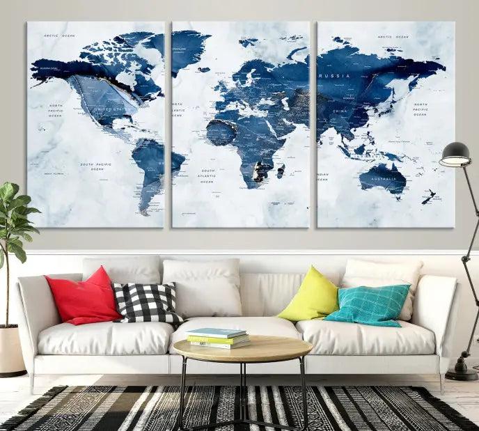 World Map Wall Art Canvas Print featuring blue continents on a textured backdrop, crafted with museum-quality polycotton and gallery-wrapped.