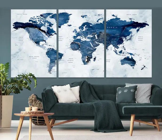 World Map Wall Art Canvas Print featuring blue continents on a textured backdrop, crafted with museum-quality polycotton and gallery-wrapped.