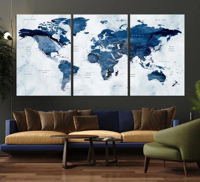 World Map Wall Art Canvas Print featuring blue continents on a textured backdrop, crafted with museum-quality polycotton and gallery-wrapped.