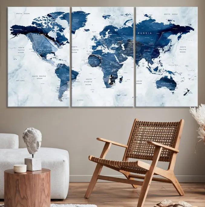 World Map Wall Art Canvas Print featuring blue continents on a textured backdrop, crafted with museum-quality polycotton and gallery-wrapped.