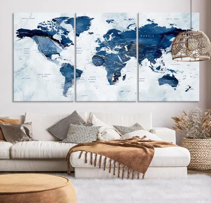 World Map Wall Art Canvas Print featuring blue continents on a textured backdrop, crafted with museum-quality polycotton and gallery-wrapped.