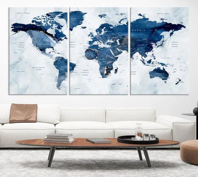 World Map Wall Art Canvas Print featuring blue continents on a textured backdrop, crafted with museum-quality polycotton and gallery-wrapped.