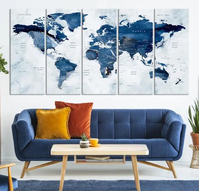 World Map Wall Art Canvas Print featuring blue continents on a textured backdrop, crafted with museum-quality polycotton and gallery-wrapped.