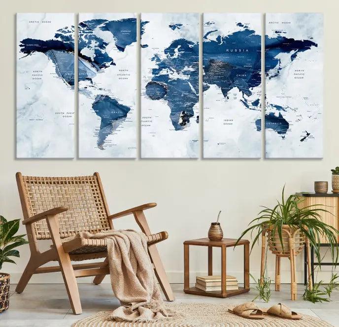 World Map Wall Art Canvas Print featuring blue continents on a textured backdrop, crafted with museum-quality polycotton and gallery-wrapped.