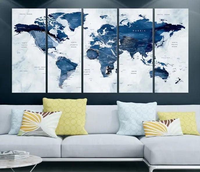 World Map Wall Art Canvas Print featuring blue continents on a textured backdrop, crafted with museum-quality polycotton and gallery-wrapped.