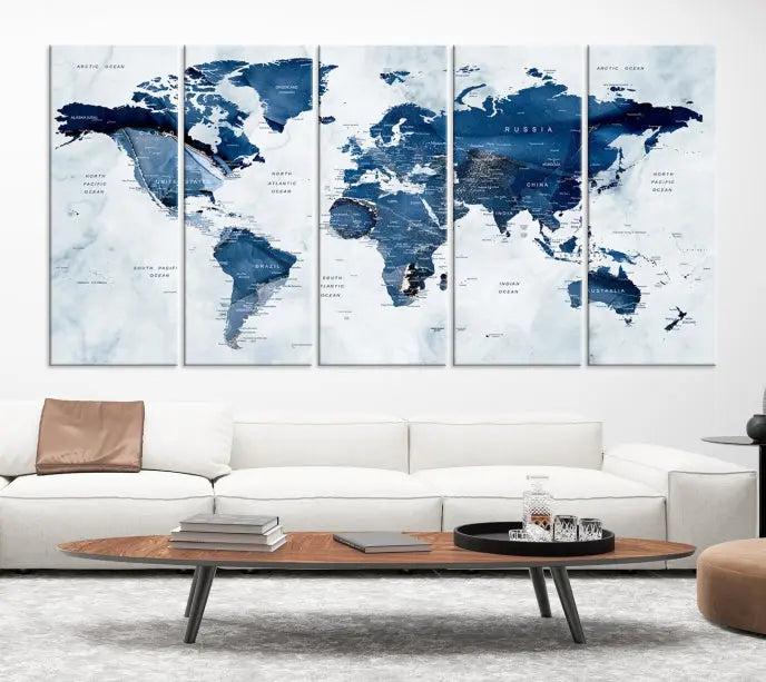 World Map Wall Art Canvas Print featuring blue continents on a textured backdrop, crafted with museum-quality polycotton and gallery-wrapped.