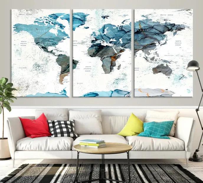 The World Map Wall Art Canvas Print, featuring a three-panel design with blue tones on museum-quality canvas, brings elegance to the room. This gallery-wrapped piece enhances the space with its sophisticated aesthetic.