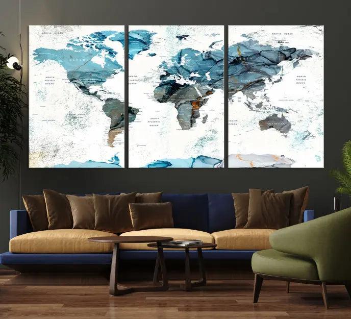 The World Map Wall Art Canvas Print, featuring a three-panel design with blue tones on museum-quality canvas, brings elegance to the room. This gallery-wrapped piece enhances the space with its sophisticated aesthetic.