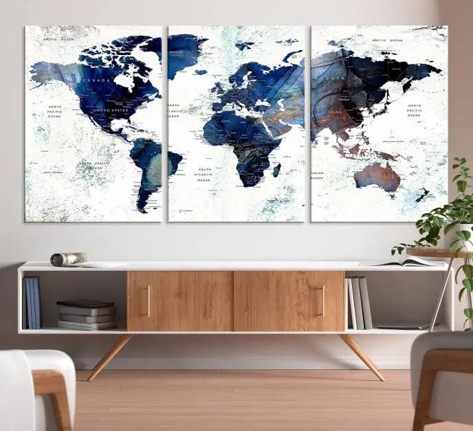 A captivating triptych titled "World Map Wall Art Canvas Print," featuring a museum-quality canvas with UV-protective coating, elegantly adorns the wall. Ready to hang, it enhances the room's sophistication.