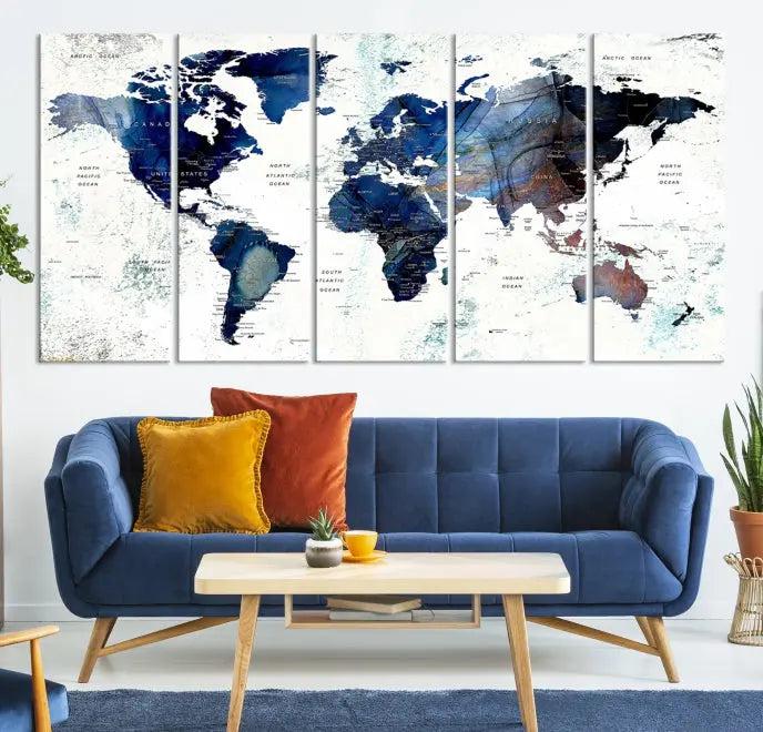 A captivating triptych titled "World Map Wall Art Canvas Print," featuring a museum-quality canvas with UV-protective coating, elegantly adorns the wall. Ready to hang, it enhances the room's sophistication.