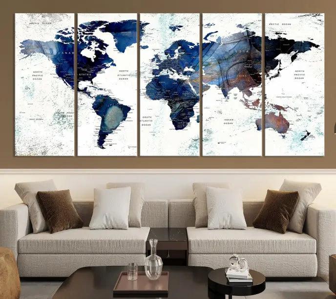 A captivating triptych titled "World Map Wall Art Canvas Print," featuring a museum-quality canvas with UV-protective coating, elegantly adorns the wall. Ready to hang, it enhances the room's sophistication.