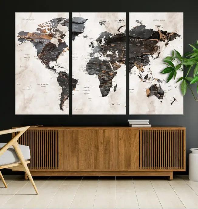 The World Map Wall Art Canvas Print, a stunning three-panel piece gallery wrapped on museum-quality canvas, hangs elegantly in this contemporary room, infusing it with worldly charm. Indulge in the luxury of this masterpiece with free shipping.