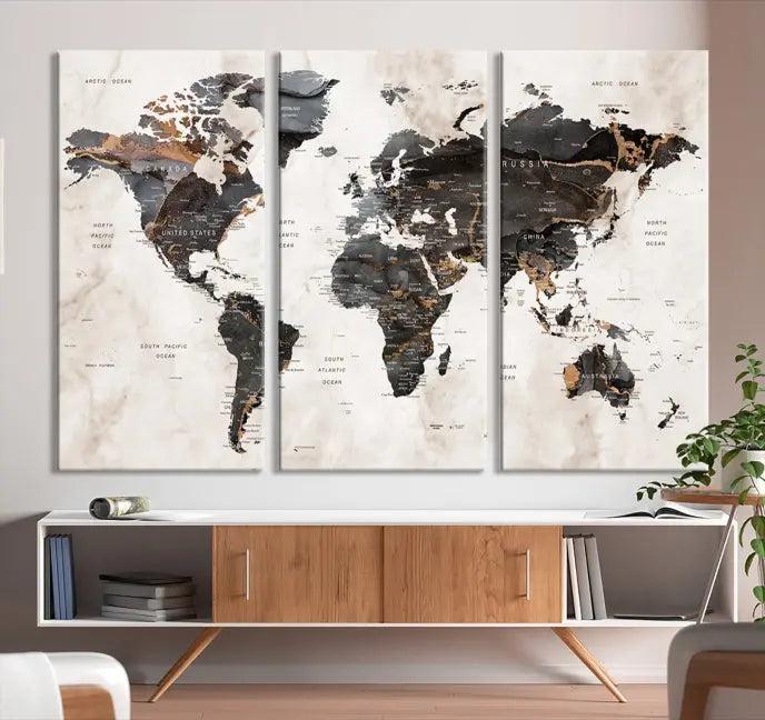 The World Map Wall Art Canvas Print, a stunning three-panel piece gallery wrapped on museum-quality canvas, hangs elegantly in this contemporary room, infusing it with worldly charm. Indulge in the luxury of this masterpiece with free shipping.