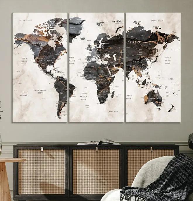 The World Map Wall Art Canvas Print, a stunning three-panel piece gallery wrapped on museum-quality canvas, hangs elegantly in this contemporary room, infusing it with worldly charm. Indulge in the luxury of this masterpiece with free shipping.