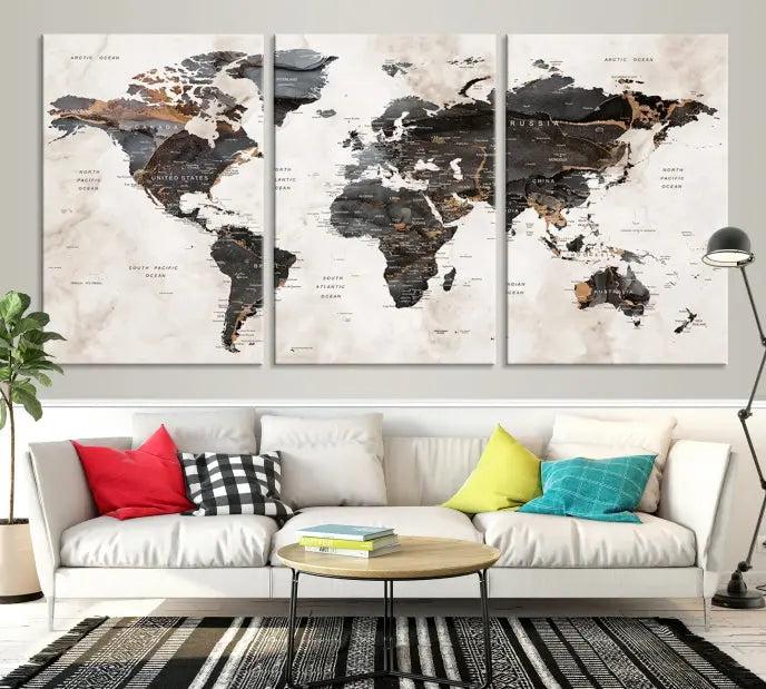 The World Map Wall Art Canvas Print, a stunning three-panel piece gallery wrapped on museum-quality canvas, hangs elegantly in this contemporary room, infusing it with worldly charm. Indulge in the luxury of this masterpiece with free shipping.