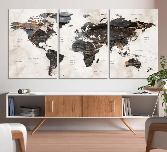 The World Map Wall Art Canvas Print, a stunning three-panel piece gallery wrapped on museum-quality canvas, hangs elegantly in this contemporary room, infusing it with worldly charm. Indulge in the luxury of this masterpiece with free shipping.