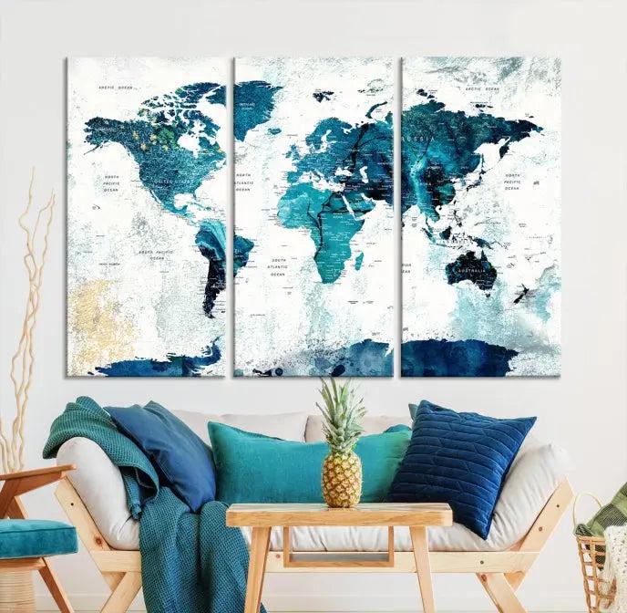 The World Map Wall Art Canvas Print features a gallery-wrapped triptych in blue and green hues. These museum-quality canvases are equipped with a UV-protective coating to keep the artwork vibrant and enduring.