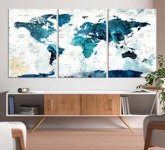 The World Map Wall Art Canvas Print features a gallery-wrapped triptych in blue and green hues. These museum-quality canvases are equipped with a UV-protective coating to keep the artwork vibrant and enduring.