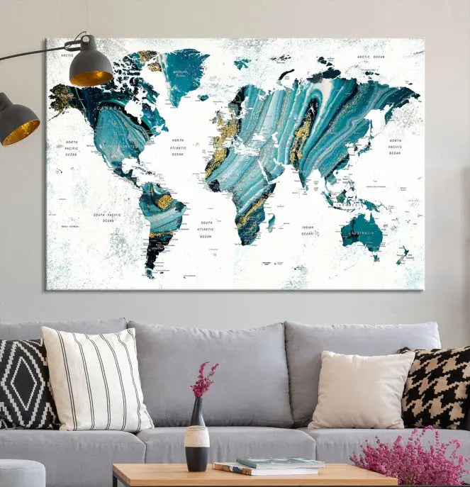 The modern living room features the World Map Wall Art Canvas Print, a three-panel abstract design on museum-quality canvases. The artwork includes a UV-protective coating and is ready to hang.